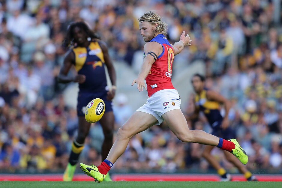 AFL 2016 Rd 01 - West Coast v Brisbane PERTH, AUSTRALIA - MARCH 27: Daniel Rich of the Lions kicks the ball during the 2016 AFL Round 01 match between the West Coast Eagles and the Brisbane Lions at Domain Stadium, Perth on March 27, 2016. (Photo by Will Russell/AFL Media)